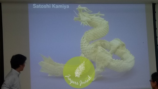 It takes months to fold this origami in the shape of a dragon