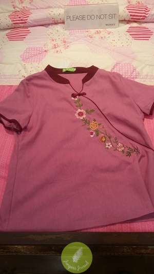 The floral embroidery on this pink top is so pretty