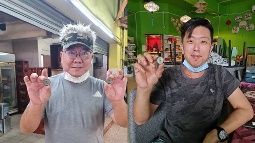 (left to right) Mr. Kenneth Yeong and Mr. Chong Foo Weng are among 680 winners, and counting, who walked home with the RM100 cash ang pau from Carlsberg