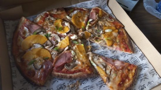 Smoked duck and peach pizza