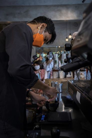 Barista mixing the O-Mighty Mocha during the drink-making
