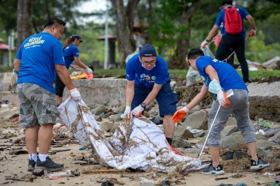 Nestlé Cares volunteers in action cleaning up the beaches