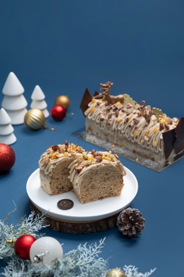 Warm Winter Log Meet the Warm Winter Log! Our nutty spin on the traditional Holiday log comprising of chestnuts and all things delicious wrapped in a pound cake! Available as a whole (RM159.00/0.7 kg) and slices (RM15.90/slice) 
